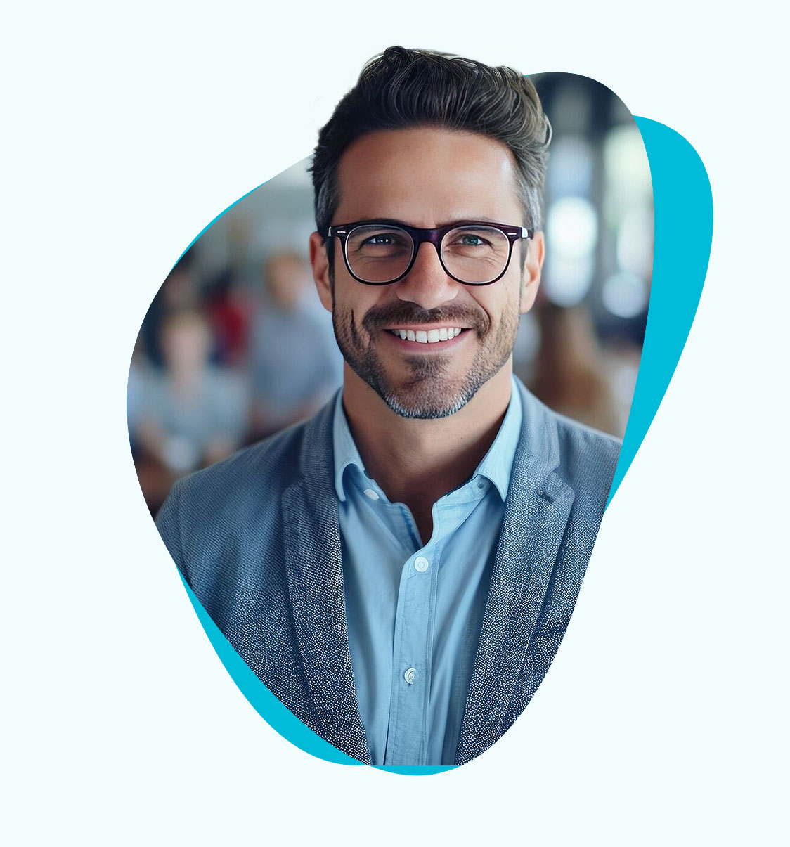 Profile photo of a man smiling. He has facial hair, glasses, and is dressed casually, but professionally.